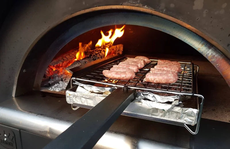 2nd Lifestyle image of Clementi Multi Cook System. By The Outdoor Grill Company.