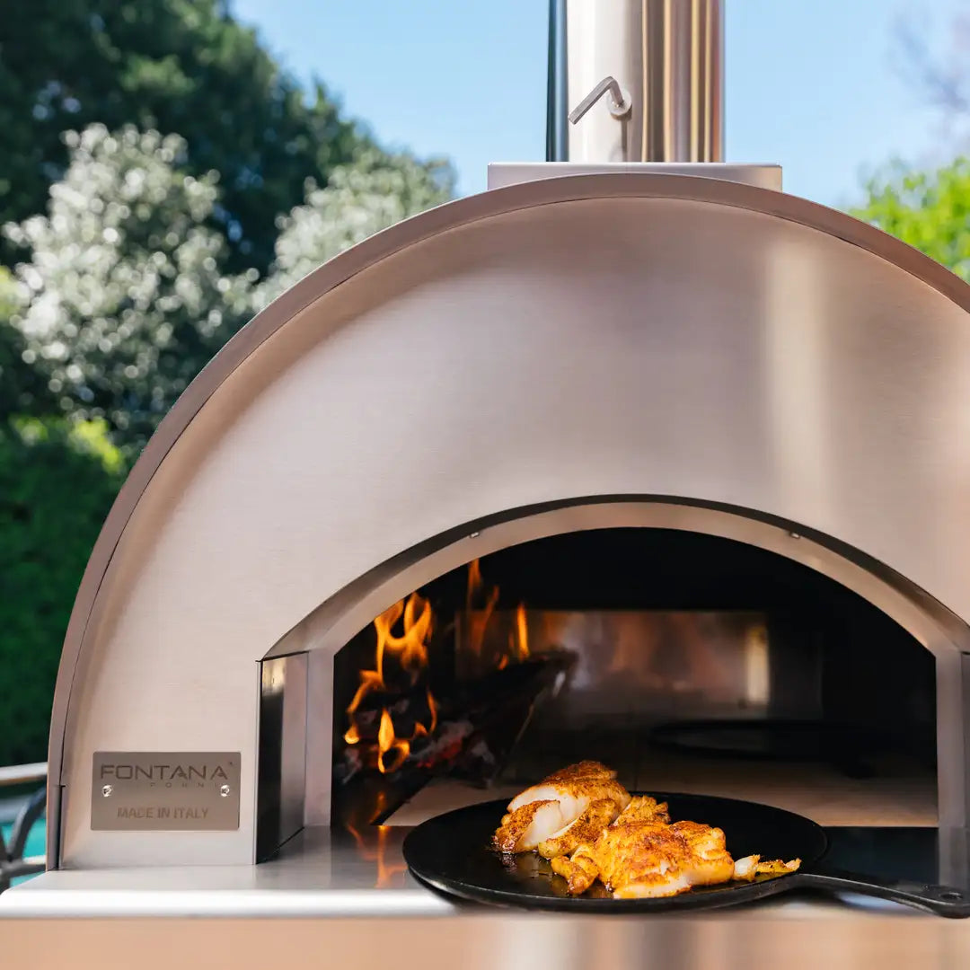 Fontana Margherita Countertop Wood Fired Pizza Oven - close up with food. The Outdoor Grill Company.