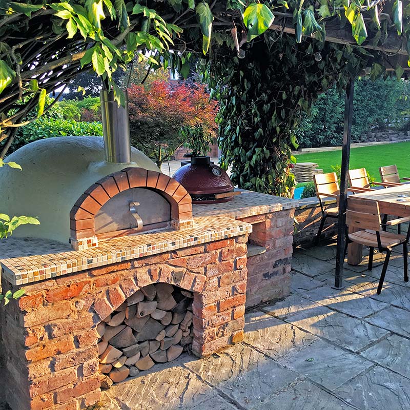 Igneus Ceramiko Pro 1000 Wood Fired Pizza Oven. Lifestyle shot. The Outdoor Grill Company.