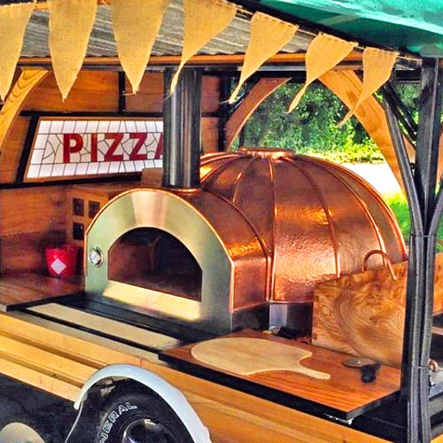 Igneus Ceramiko Pro 1000 Wood Fired Pizza Oven. Lifestyle shot. The Outdoor Grill Company.