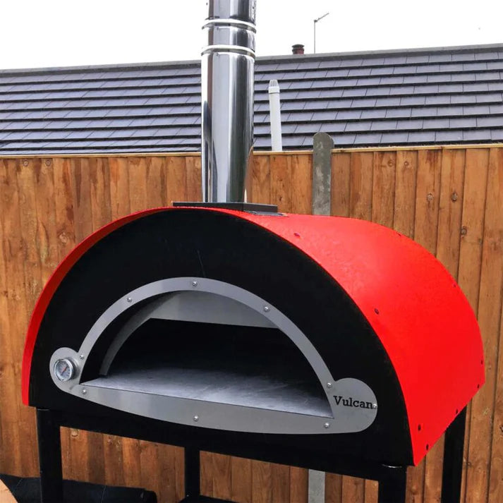 Outdoor picture of Inferno Vulcan Plus shown in Red. The Outdoor Grill Company.